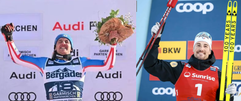 Deux skieurs, de jeunes hommes, souriants, lèvent les bras en signe de victoire. Celui de gauche tient un bouquet dans la main gauche. celui de droite tient ses skis d'une main, ses bâtons de l'autre.