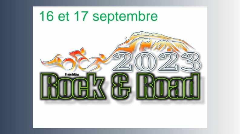 Logo du raid "Rock and road 2023" composé du mot "Défi" en lettres minuscules en orange en haut, du mot "ROCK" et du mot "ROAD" en lettres majuscules, respectivement à gauche et à droite et en bleu. Le mot "Défi" est superposé aux lettres C et K du mot "rock". De couleur orange, le f de "Défi" prolonge le haut de la lettre K du mot "ROAD" et vient former le signe "and" entre les mots "ROCK" et "ROAD" avant de rejoindre la lettre R du mot "ROAD". Sur la droite de cette composition se trouve le nombre 2023, positionné de manière oblique. Les chiffres sont de couleur bleue. L'ombrage est orange.