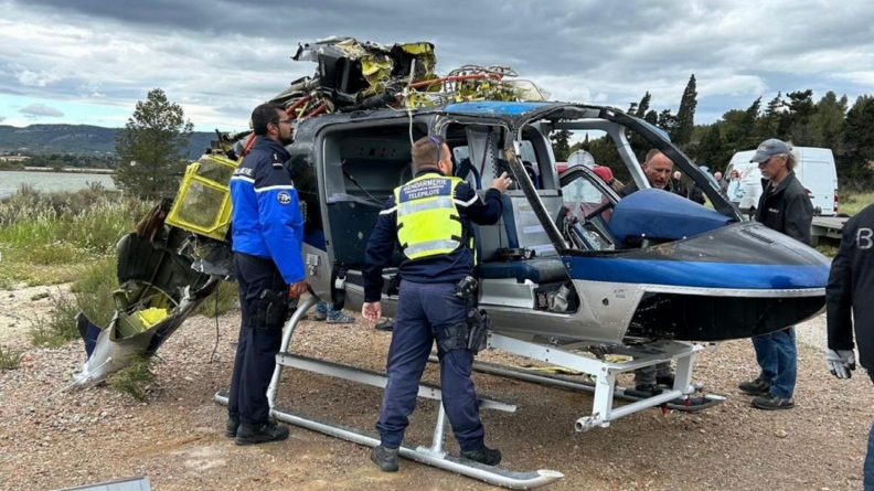 Hélicoptère accidenté inspecté par la gendarmerie.