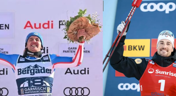 Deux skieurs, de jeunes hommes, souriants, lèvent les bras en signe de victoire. Celui de gauche tient un bouquet dans la main gauche. celui de droite tient ses skis d'une main, ses bâtons de l'autre.