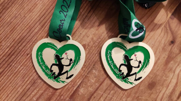Deux médailles de la Course du coeur 2023